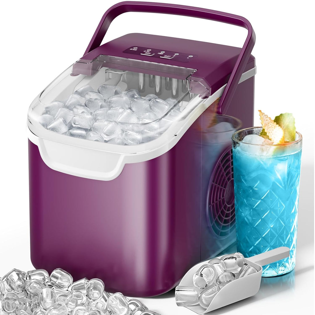 Purple portable ice maker with a glass of blue cocktail and ice cubes on a white background