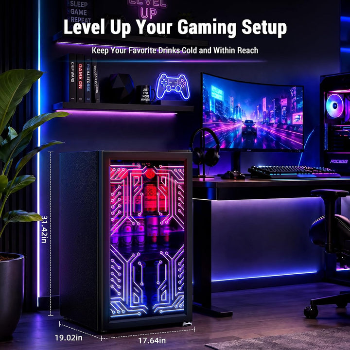 A black gaming PC tower with a glowing multicolor circuit-board style front panel, shown in a styled home office/gaming room setup. The room has a desk, curved monitor, keyboard, chair, shelving, and ambient purple LED lighting.