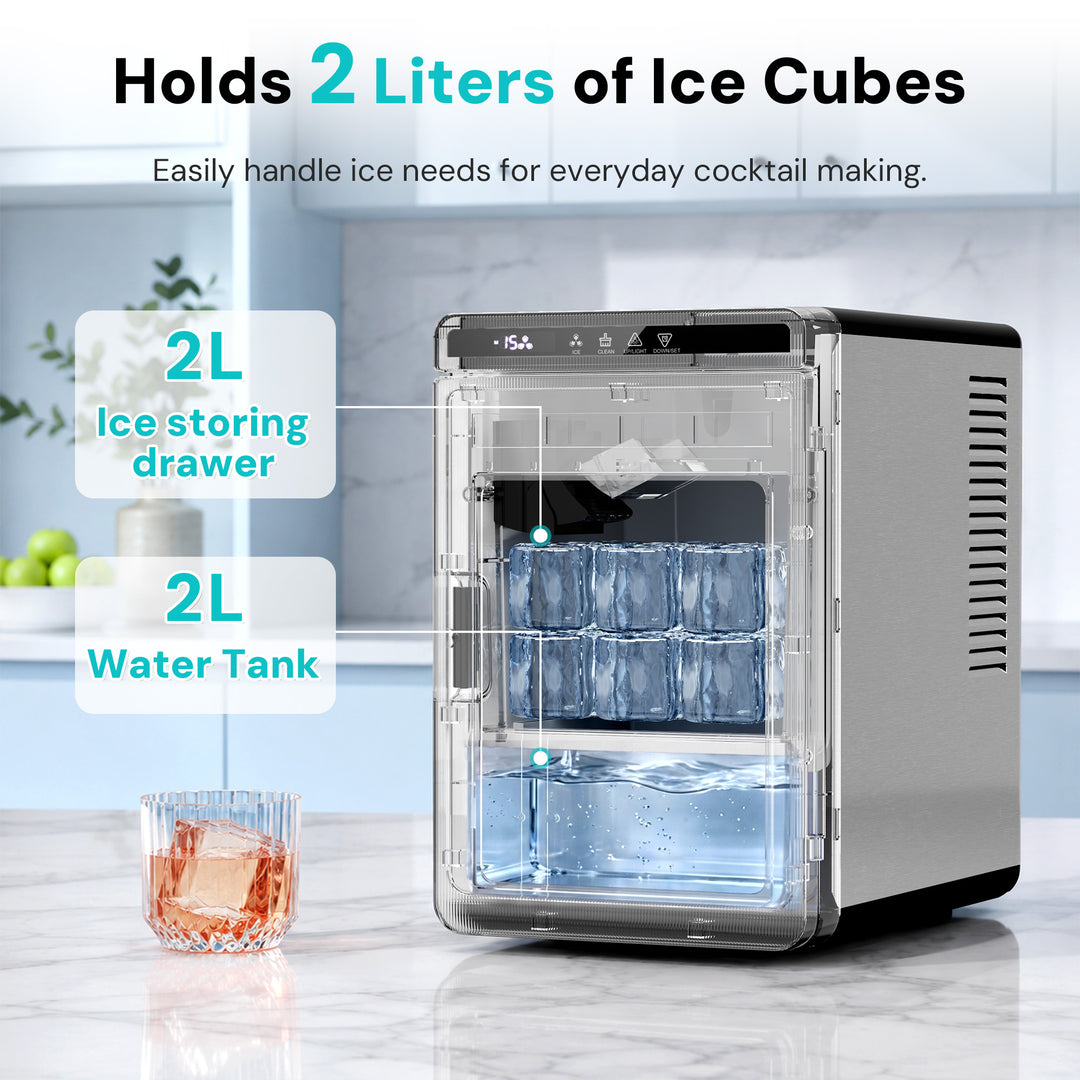 A 2-liter ice cube maker and water tank on a marble countertop in a kitchen setting, with text overlays highlighting its 2-liter ice storage drawer and 2-liter water tank. A glass with ice cubes is shown on the left.