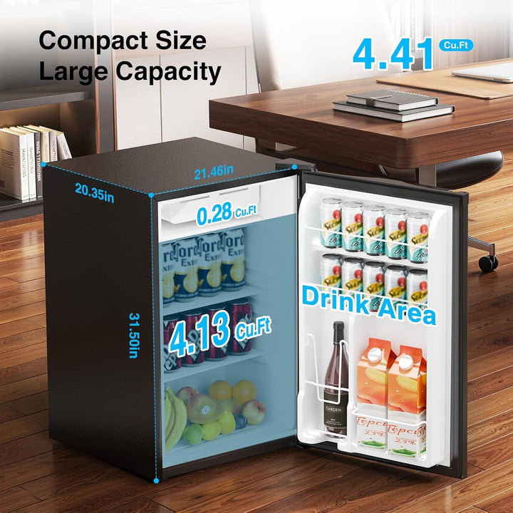 Small refrigerator with open door showing drinks and food in a home office setting